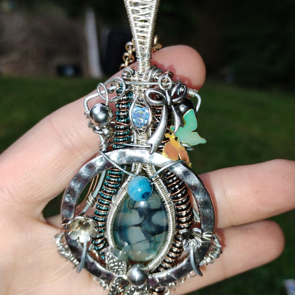 Handcrafted Silver Pendant with Blue and Green Accents